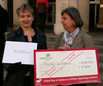 Kate Hudson, CND and Pat Gaffney, Pax Christi present 'cancelled' cheque to Ministry of Defence